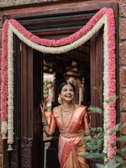 A candid, joyful moment. The bride's makeup is designed to last through all the laughter and happiness of her wedding day.