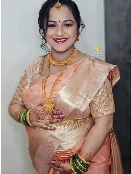 There's nothing more special than a baby shower. Here is the glowing mom-to-be, Shweta, looking absolutely radiant. We chose a soft, peachy-pink makeup look to complement her beautiful saree and the happy occasion.