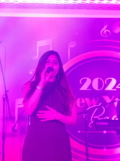 A dreamy, blurry shot from a New Year's Eve party performance. The purple lighting created such a magical vibe.