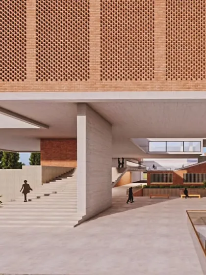 Even in larger institutional projects, the connection between inside and outside is key. For this building, we used large overhangs, patterned brick jali screens, and open corridors to foster a sense of community and allow natural light and air to flow freely.