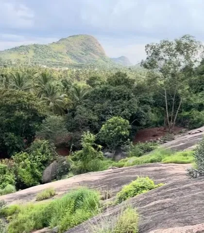The view from the Gethnaa crag, with a train passing through the valley below. It's a unique and picturesque climbing location.