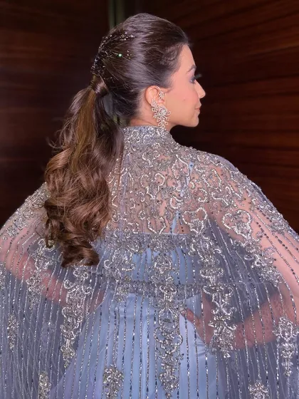 A side view of the glitter ponytail, a great option for clients who want to add a bit of sparkle and fun to their look.