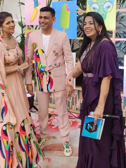 More fun interviews with beautifully dressed guests at the pre-wedding carnival.