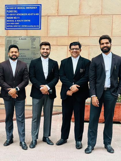 A formal group photo with my colleagues. Professionalism is at the core of our practice.