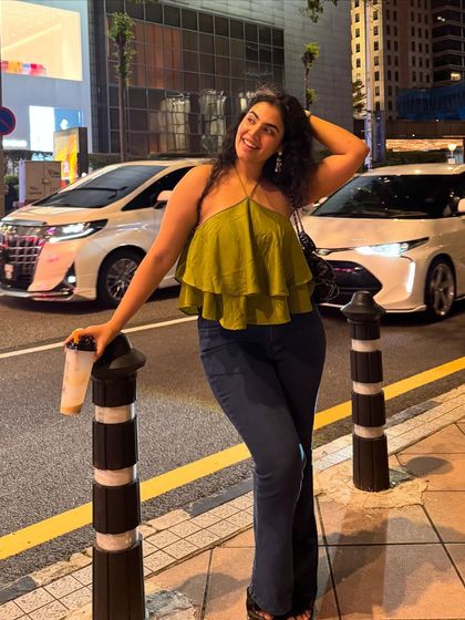 A playful, happy moment on a city street. I focus on conveying genuine emotion in my content, which makes it more relatable and engaging.