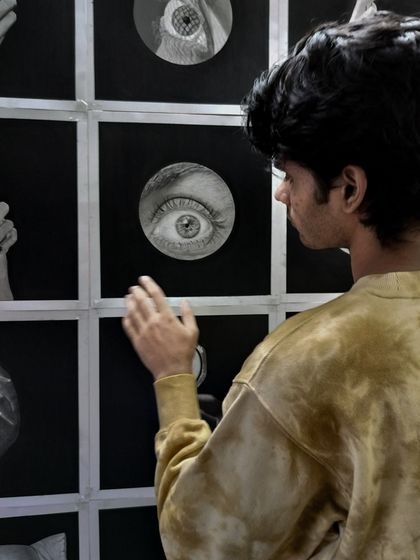 A closer look at me interacting with the drawings. Each one holds a memory of the day it was created and the specific challenge it presented.