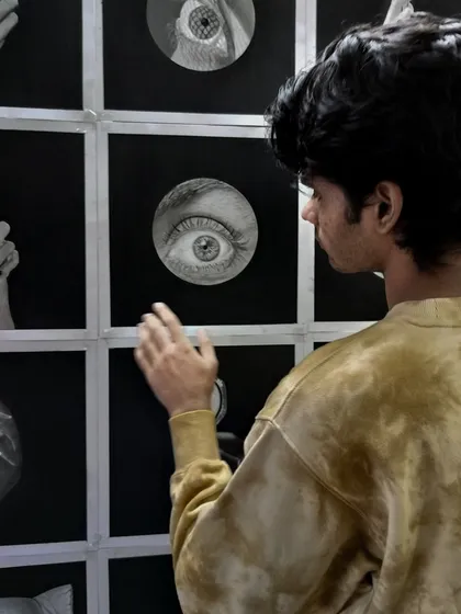 A closer look at me interacting with the drawings. Each one holds a memory of the day it was created and the specific challenge it presented.
