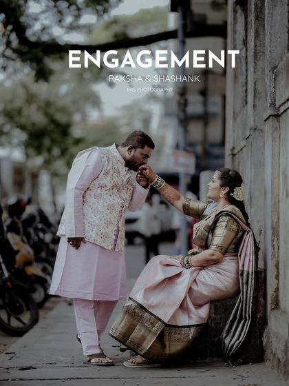 An engagement photo taken on a city street, showing a classic, chivalrous moment. I love finding beauty in everyday locations to make your shoot unique.