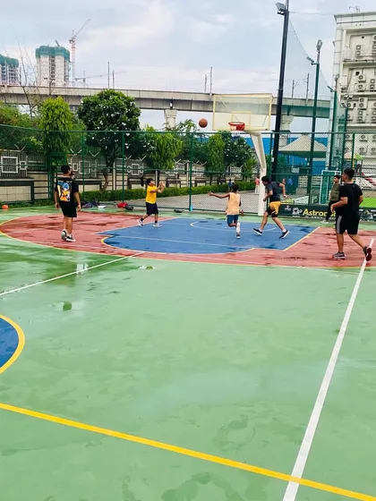A player takes a long shot.