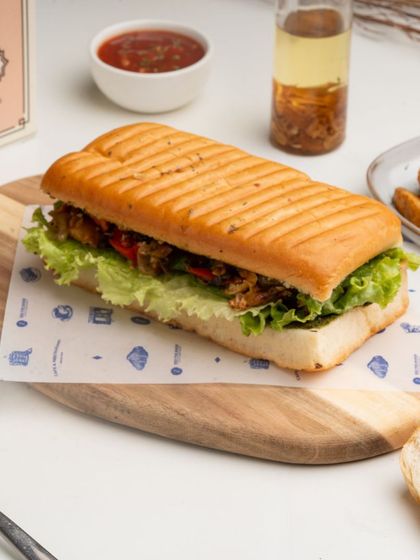 Another view of the Pesto Grilled Vegetable Focaccia, highlighting the generous filling and the perfectly toasted bread.