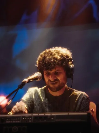 Michael League, smiling and enjoying the music during our 'Vari' album release concert. His love for music is infectious and spreads to everyone on stage and in the audience.
