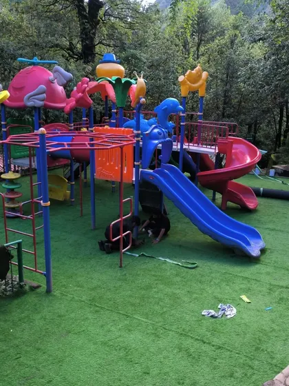 This is from a large project at the Nainital Eco Cave Garden. I installed durable, soft-feel artificial turf across the entire children's park, making it a safe, clean, and mud-free play zone for kids, no matter the weather.