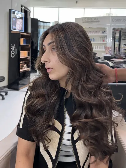 A side view of the mushroom brown color, showing how the cool, ashy tones are blended with a brown base for a multi-dimensional look.
