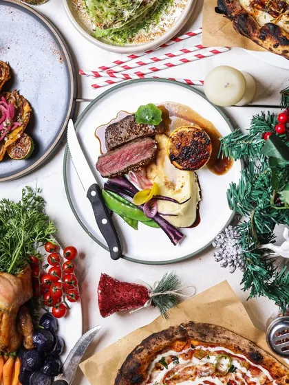 Our Christmas Brunch is one to remember. This festive spread features a beautiful roast chicken, tenderloin steak, pizzas, and tacos.
