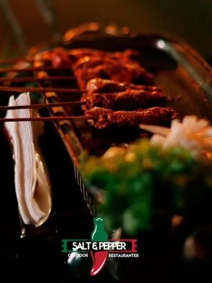 Juicy and flavorful mutton seekh kebabs, fresh off the grill. This is a classic non-vegetarian appetizer that is always a hit at weddings and parties.