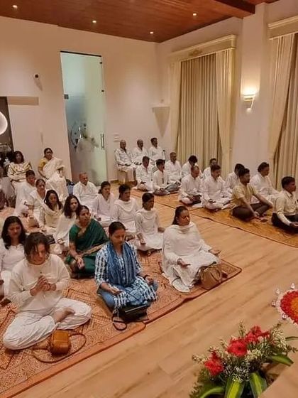 A group of seekers meditating at our Bangalore centre. The spacious hall allows for a comfortable and peaceful experience for everyone.