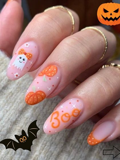 A cute and playful Halloween set. We hand-painted adorable ghosts, pumpkins, and the word 'Boo' for a look that is more sweet than scary.