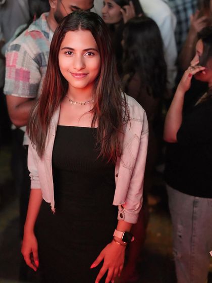 A guest enjoying the party. The dance floor is always packed with happy faces.