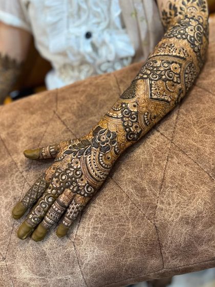A clear, full view of the arm, showcasing the combination of different patterns.