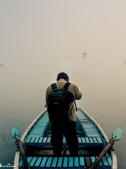 This is me, out on the water with my camera. Being a photographer is about immersing yourself in the environment to find the perfect shot, and I love every minute of it.