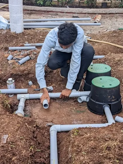 A close-up of the intricate pipe and valve connections. We test the entire system for leaks before burying it.