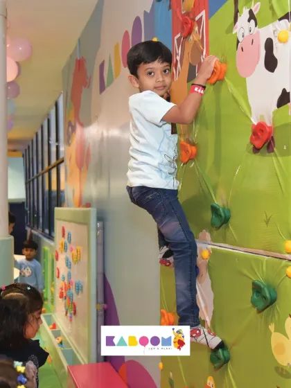 Reach for the top! Our padded climbing wall offers a fun and safe challenge for little adventurers, helping them build confidence and strength with every step.