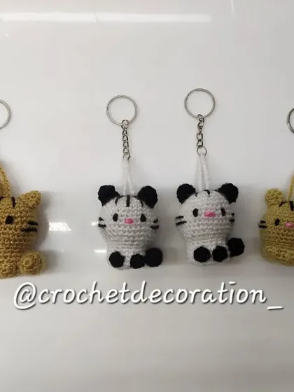 We often get bulk orders for our tiny cat keychains, shown here in different colors. They make for excellent and affordable return gifts for birthday parties or baby showers.