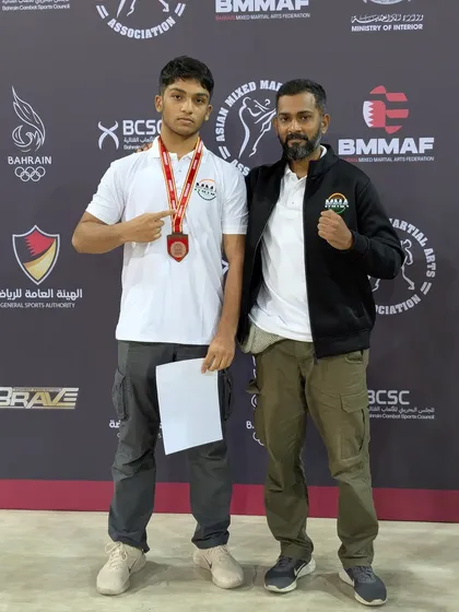 A proud moment with one of our youth champions after he secured a bronze medal at the AMMA Asian Youth Championship in Bahrain. This is the bond between a coach and a fighter.