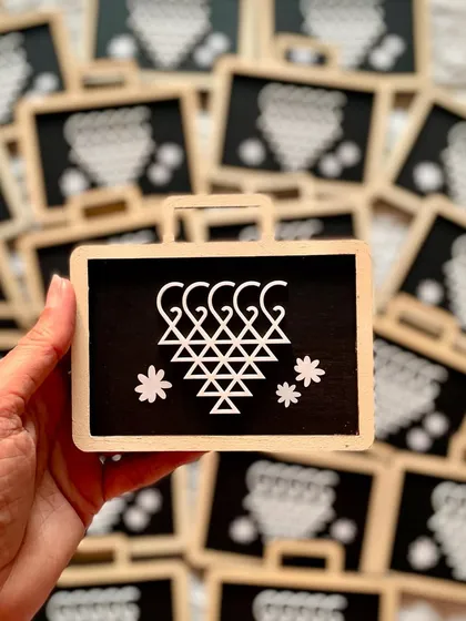 These 'Saraswati Pati' magnets are designed to look like the traditional slate used for learning. They are a popular gift for students and during the festival of Navratri for Saraswati Pujan.
