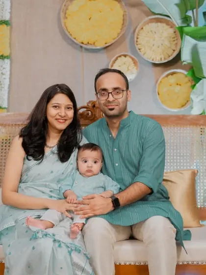 The proud parents with their baby. We are always grateful to be part of creating the backdrop for such precious family moments.