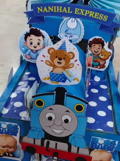 This 'Nanihal Express' hamper uses a Boss Baby theme. It's a popular choice for gifts coming from the maternal grandparents' side.