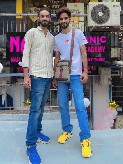 A picture with a friend and supporter at my nail academy.