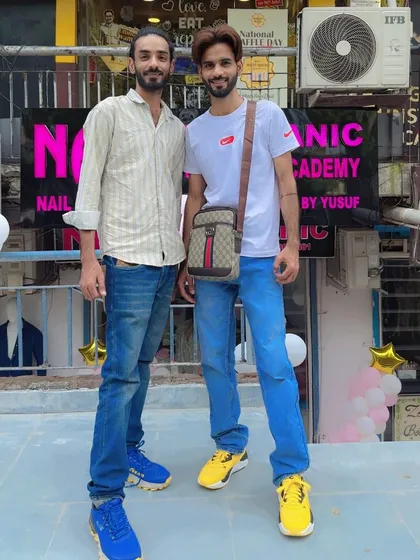 A picture with a friend and supporter at my nail academy.
