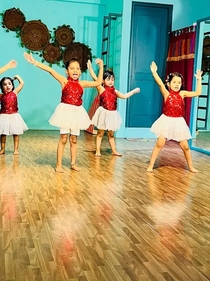 A group of our beginners in the middle of their routine. Their energy and synchronization are a joy to watch.