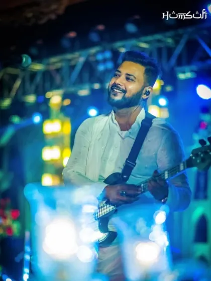 The smile on our bassist's face says it all. We love performing at celebrations.