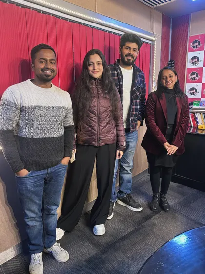 A group photo at the Fever FM studio. Sharing my music and my story with a wider audience through radio is always an exciting opportunity.