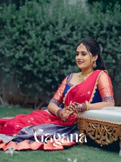 A relaxed and regal portrait of Gagana. Her colorful half saree and the elegant outdoor setting combine for a beautiful engagement photo.