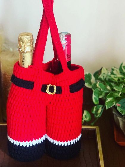 The Santa pants double bottle carrier is a unique and practical gift for any wine lover.