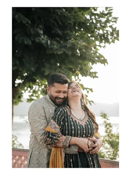 A moment of pure, uninhibited laughter. We believe in capturing the real, candid emotions that define your relationship.