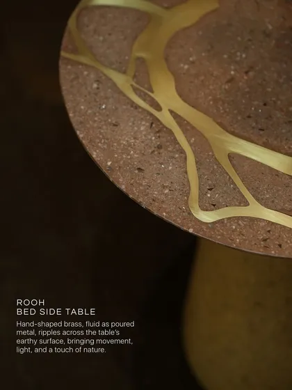 The Rooh Side Table doesn’t seek attention, but it always finds it. Hand-shaped brass flows like liquid metal across the earthy, terrazzo surface, bringing movement and a touch of nature. It’s a piece that quietly holds your moments, making everything feel intentional.