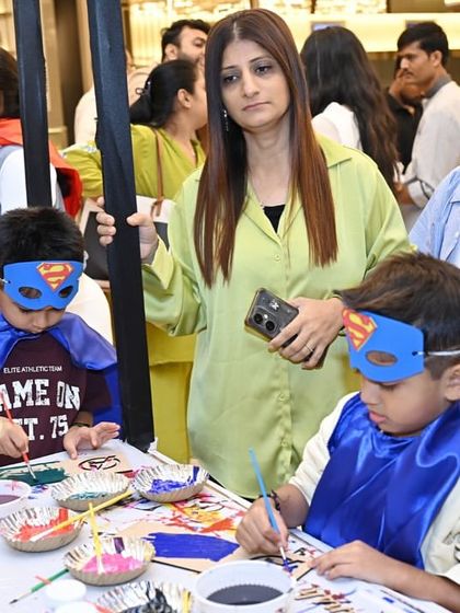 Little heroes in training, focused on painting their own superhero masks and capes. These craft corners are always a huge hit and give kids a fun, creative outlet during the party.
