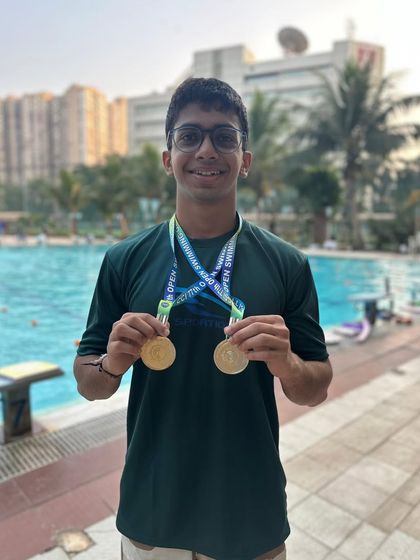 Nidhish Mhapsekar celebrates his double gold medal win in the 4x50m Freestyle and Medley relays at the Individual Championship.