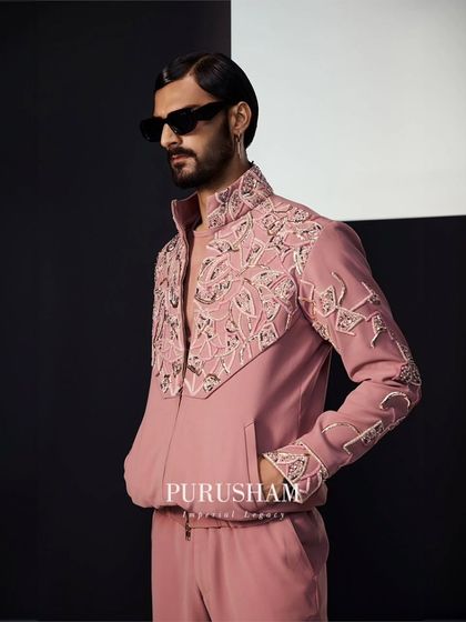 The palette for my Summer '24 collection is inspired by sun-kissed glows and tranquil ocean blues. This embroidered bomber set in dusty rose perfectly captures that seasonal essence.