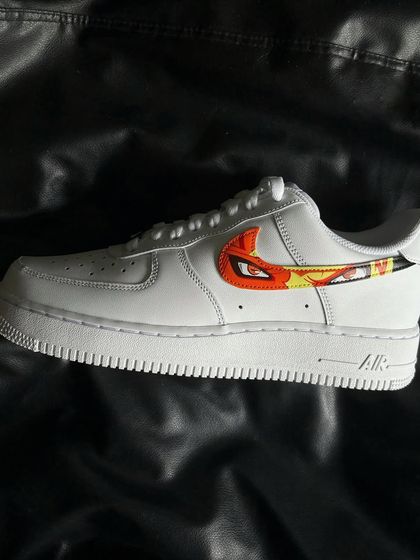 A custom Nike Air Force 1 featuring a minimalist design of Naruto's Six Paths Sage Mode integrated into the swoosh.