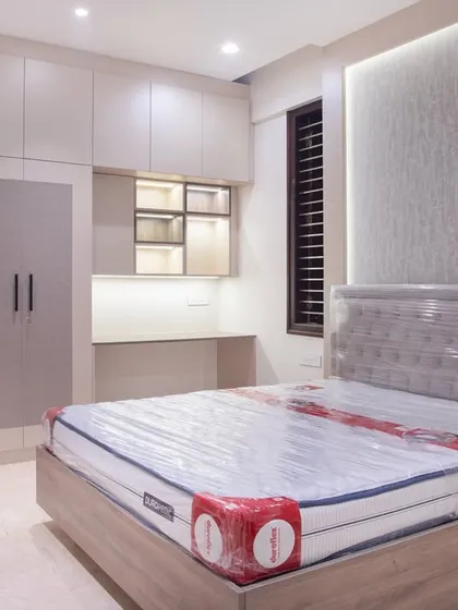 This guest bedroom was designed with one intention: to make every guest feel instantly at home. From the warm bed to the subtle texture play, everything is calm and welcoming.