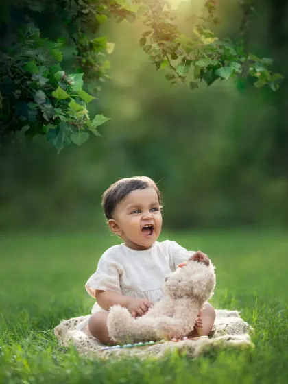 My sessions aren't just limited to the studio. For older babies and toddlers, an outdoor photoshoot in a Mumbai park can be a wonderful way to capture their playful spirit in a natural setting.