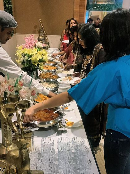 Guests enjoying a delicious and varied spread. We ensure our buffet lines are always well-stocked, beautifully presented, and easy for guests to navigate.