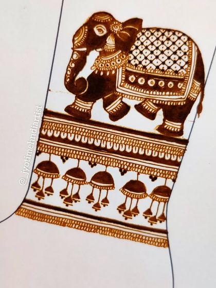 A sketch of a bridal startup pattern for the arm, featuring an elephant and hanging jhumkas.