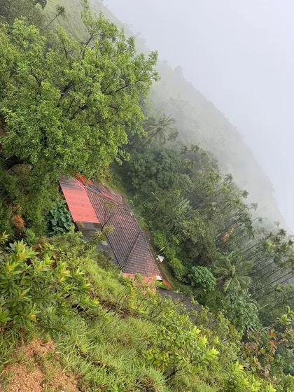 A view of the homestay nestled in the hills, the starting point for our Kumara Parvatha trek from the Somavarapete side.
