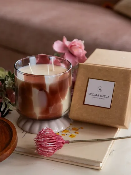 A closer look at our Oud & Bergamot candle, featuring a sophisticated pattern in a neutral palette. This two-wick soy candle is a perfect gift, offering a warm and inviting fragrance in an elegant glass vessel.